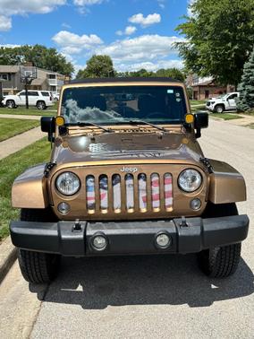 Gold 2015 Jeep Wrangler Unlimited Sahara