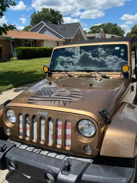 Gold 2015 Jeep Wrangler Unlimited Sahara