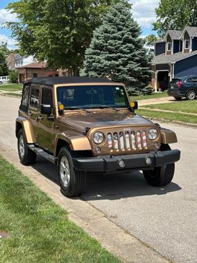 Gold 2015 Jeep Wrangler Unlimited Sahara