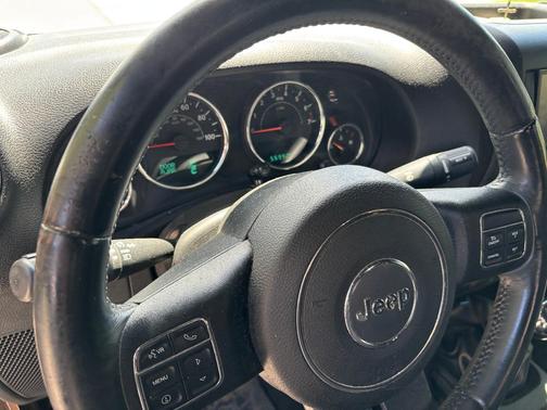 Gold 2015 Jeep Wrangler Unlimited Sahara