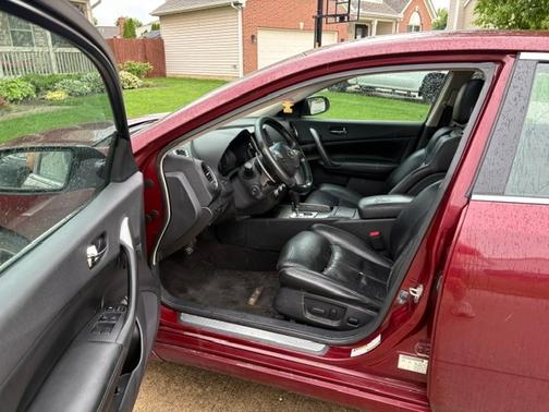 Red 2013 Nissan Maxima SV