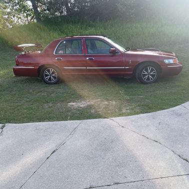 Red 2000 Mercury Grand Marquis GS