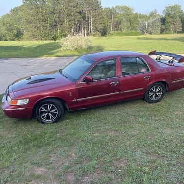Red 2000 Mercury Grand Marquis GS