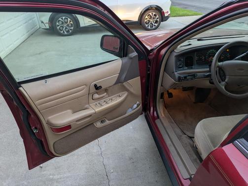 Red 1997 Ford Crown Victoria LX