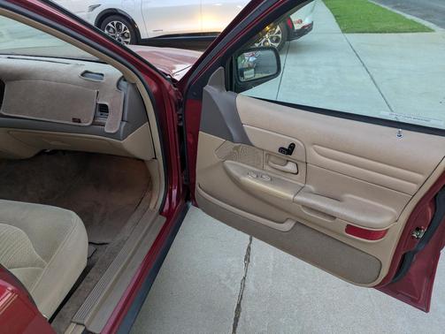 Red 1997 Ford Crown Victoria LX