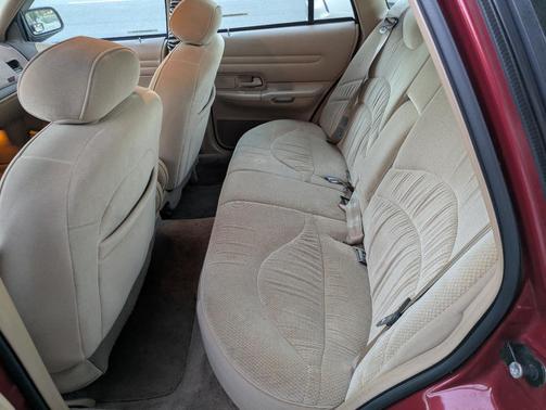 Red 1997 Ford Crown Victoria LX