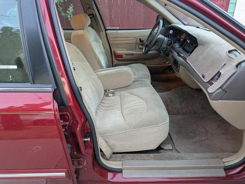 Red 1997 Ford Crown Victoria LX