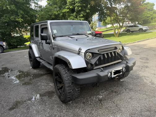 Silver 2013 Jeep Wrangler Unlimited Sahara