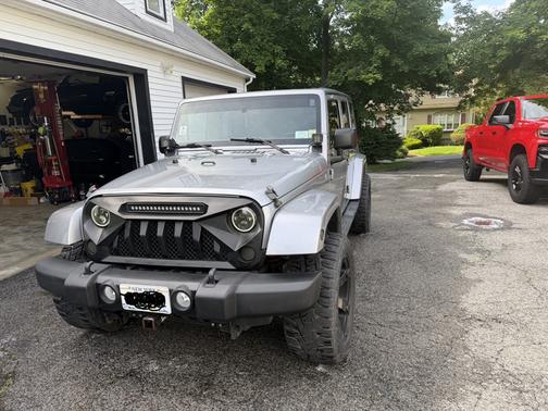 Silver 2013 Jeep Wrangler Unlimited Sahara