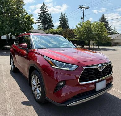 Red 2020 Toyota Highlander Hybrid Platinum