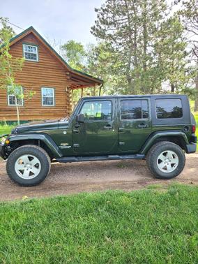 Green 2010 Jeep Wrangler Unlimited Sahara