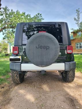 Green 2010 Jeep Wrangler Unlimited Sahara