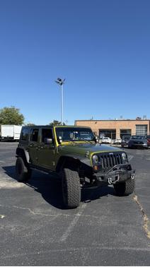 Green 2010 Jeep Wrangler Unlimited Sport