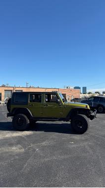 Green 2010 Jeep Wrangler Unlimited Sport