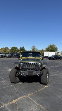 Green 2010 Jeep Wrangler Unlimited Sport