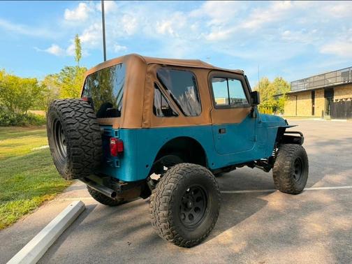 Blue 1997 Jeep Wrangler Sport