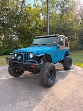 Blue 1997 Jeep Wrangler Sport