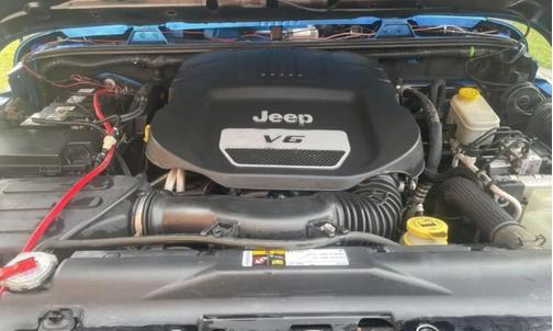 Blue 2014 Jeep Wrangler Willys Wheeler