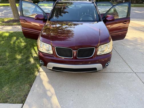 Red 2008 Pontiac Torrent Base