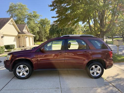 Red 2008 Pontiac Torrent Base