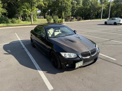 Black 2011 BMW 335 is