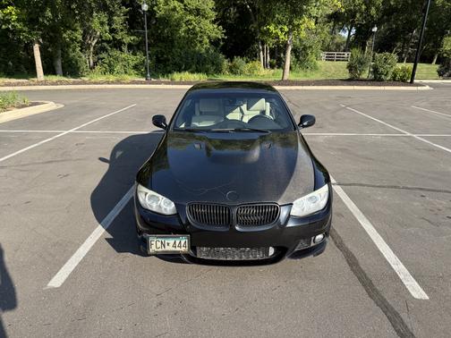 Black 2011 BMW 335 is