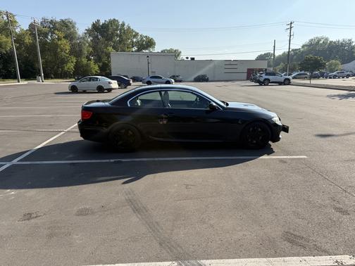 Black 2011 BMW 335 is