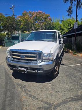 White 2002 Ford F-250 XLT SuperCab Super Duty