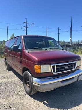 Red 2003 Ford E150 Base