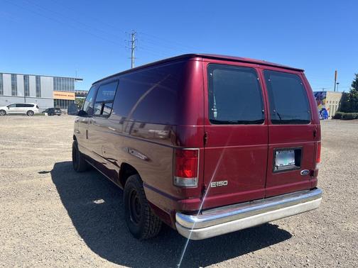 Red 2003 Ford E150 Base