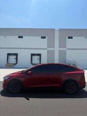 Red 2024 Tesla Model X Plaid