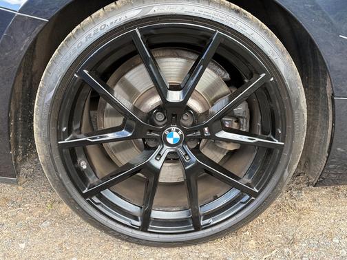 Black 2024 BMW 840 i xDrive