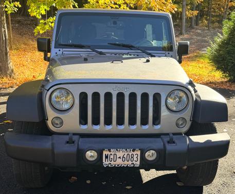 Gray 2016 Jeep Wrangler Unlimited Sport