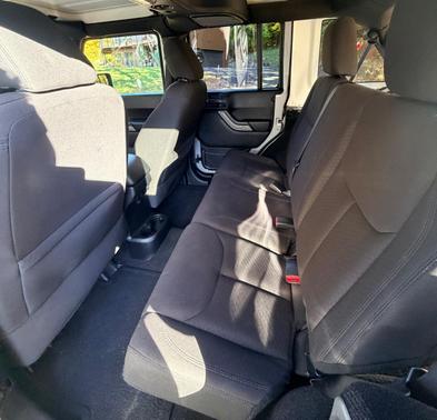 Gray 2016 Jeep Wrangler Unlimited Sport