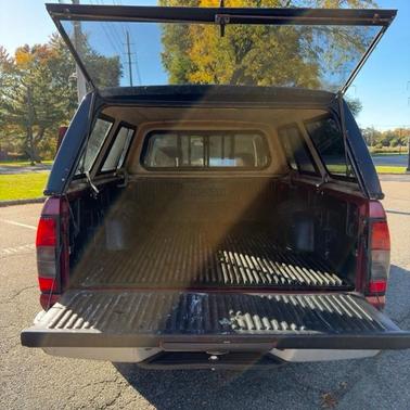 Red 2001 Nissan Frontier XE King Cab