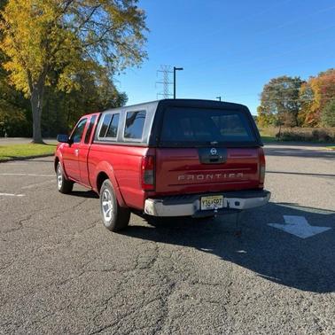 Red 2001 Nissan Frontier XE King Cab