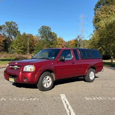 Red 2001 Nissan Frontier XE King Cab