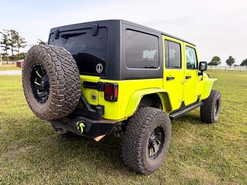 Green 2016 Jeep Wrangler Unlimited Sport