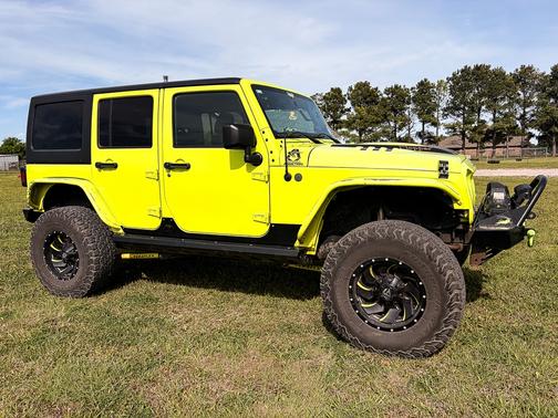 Green 2016 Jeep Wrangler Unlimited Sport