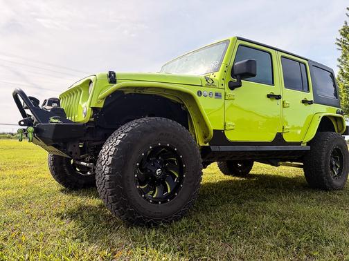 Green 2016 Jeep Wrangler Unlimited Sport