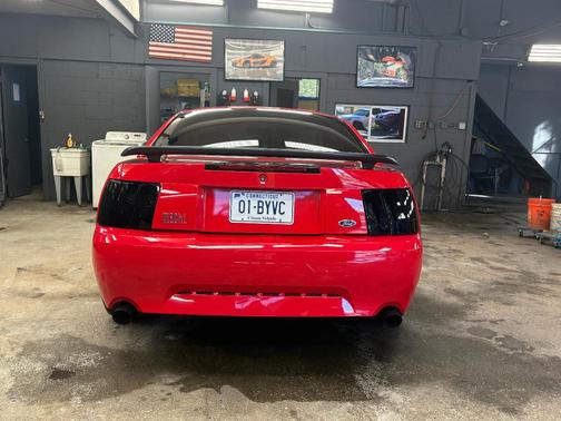 Red 2003 Ford Mustang Mach I
