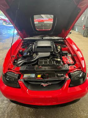 Red 2003 Ford Mustang Mach I