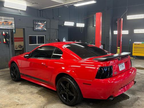 Red 2003 Ford Mustang Mach I