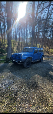 Blue 2015 Jeep Wrangler Unlimited Sahara