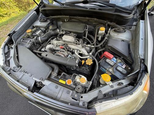 Silver 2010 Subaru Forester 2.5 X