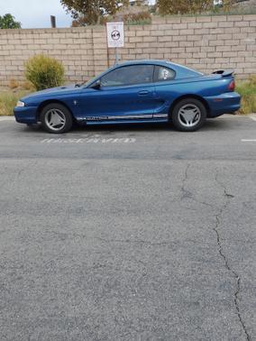 Blue 1998 Ford Mustang Base