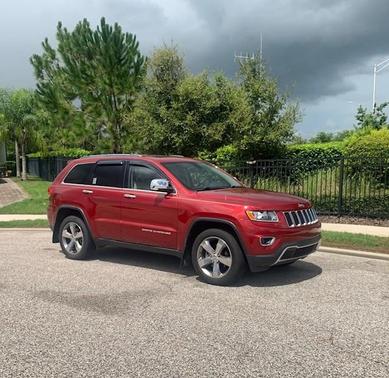 Red 2014 Jeep Grand Cherokee Limited