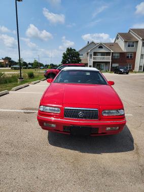 Red 1995 Chrysler LeBaron GTC