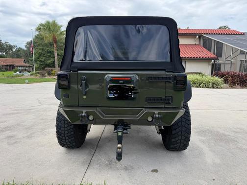 Green 2016 Jeep Wrangler Unlimited Sport