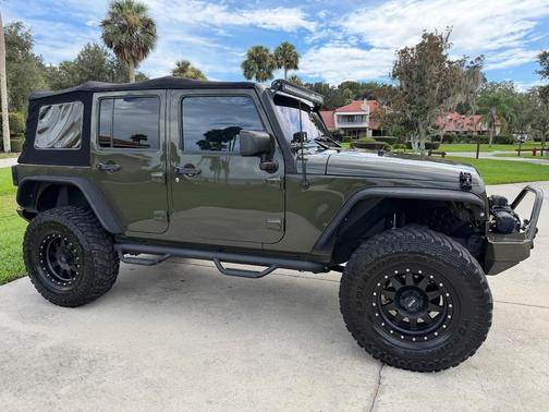 Green 2016 Jeep Wrangler Unlimited Sport